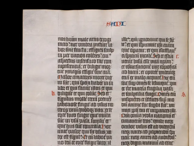 The image shows an open book with a page from a medieval manuscript featuring a red and white text...