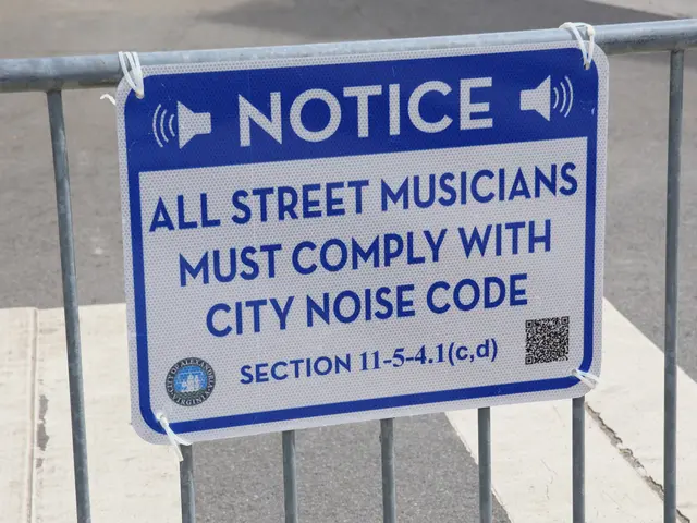 The image shows a notice board attached to a fence with a sign that reads "Notice: All Street...