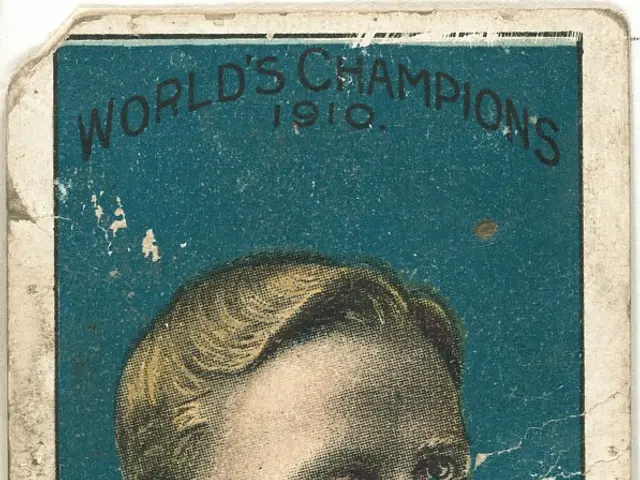 The image shows an old baseball card with a picture of a man on it. The man has a serious...