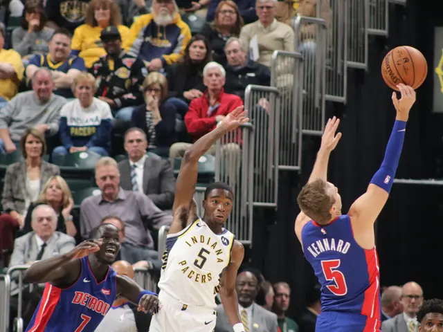 The image shows a basketball game between the Indiana Pacers and the Detroit Pistons. There are...