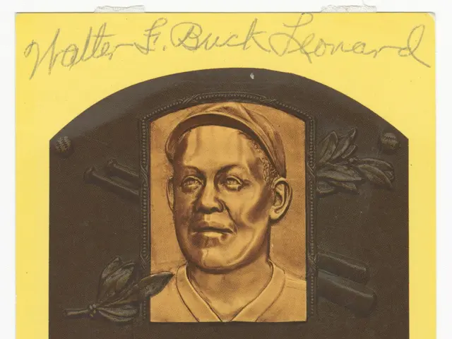 The image shows a baseball card with a picture of Walter Fennner Leonard on it. The card has text...