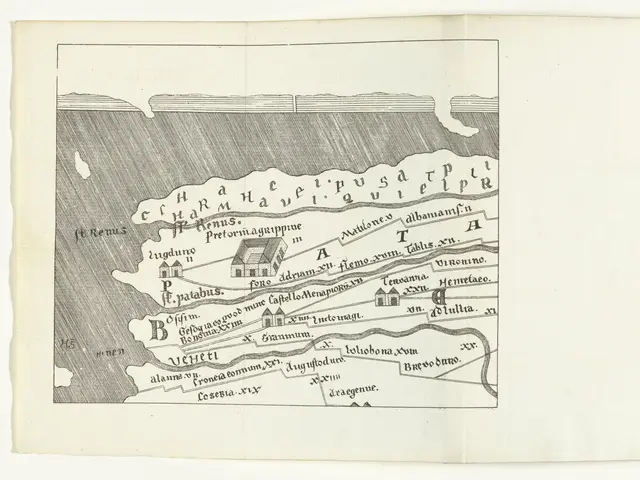 The image shows an open book with a drawing of a map on it. The map is detailed and shows various...