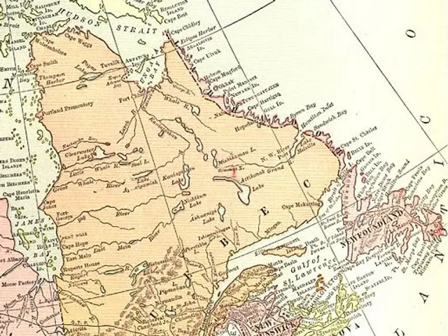 The image shows an old map of the dominion of Canada and Newfoundland, with text written on it. The...
