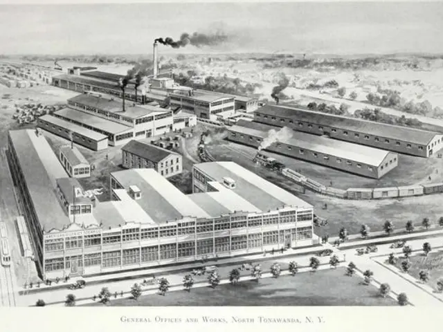 The image shows an aerial view of a factory with smoke coming out of it, surrounded by buildings,...