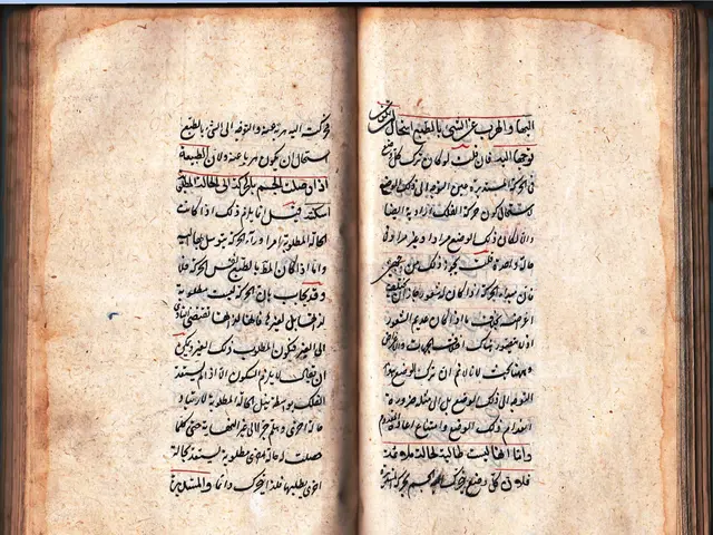 The image shows an open book with Arabic writing on it. The text is written in a beautiful...