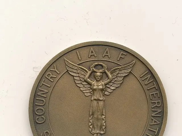 The image shows a bronze medal with the words "IAAF Cross Country International" inscribed on it,...