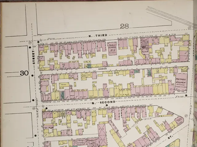 The image shows an open book with a map of the city of Hudson, New York. The map is detailed and...