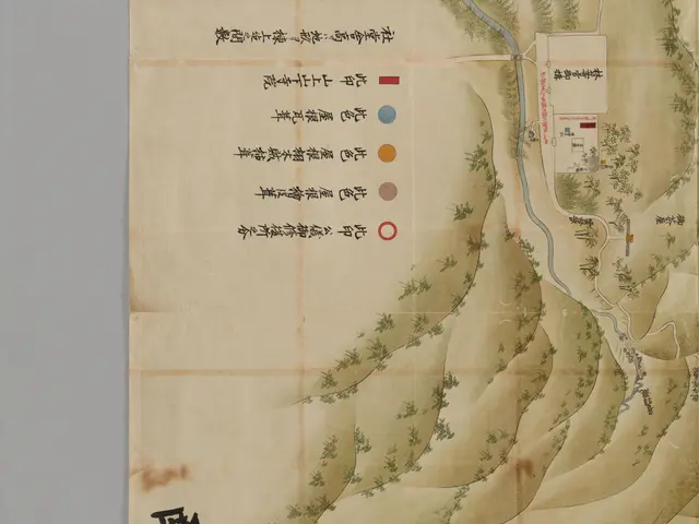 The image shows a map of a Chinese village with Chinese writing on it. The map is detailed and...