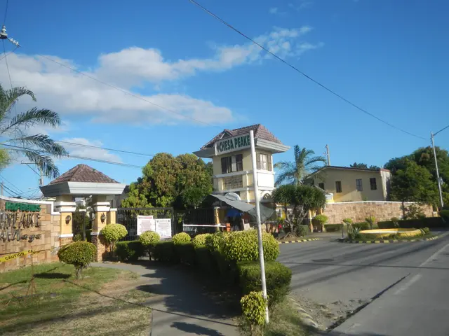 The image shows a for sale lot/land/farm in Cebu City, Philippines. It features buildings, trees,...