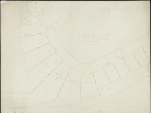 The image shows a black and white drawing of a map of a city with a lot of buildings, which is...