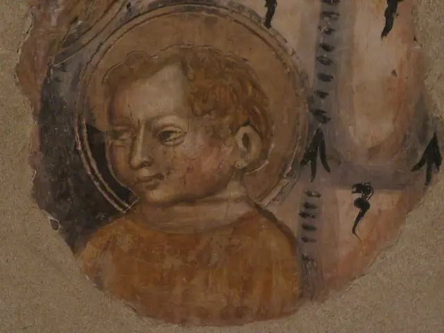 The image shows a painting of a child on a wall in a church. The painting depicts a young boy with...