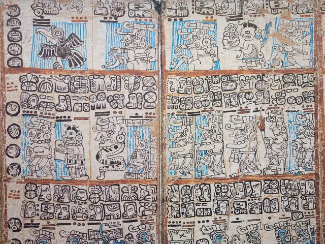 The image shows an ancient Mayan calendar on the wall of a building in Mexico. The calendar is...