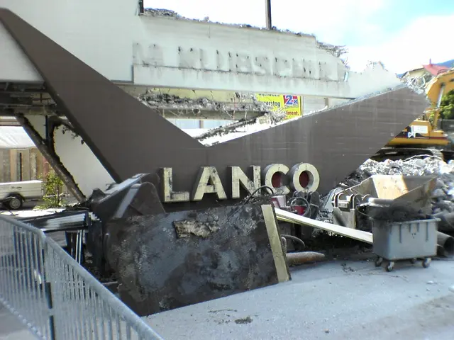 The image shows a building that has been demolished and is in the process of being demolished. We...