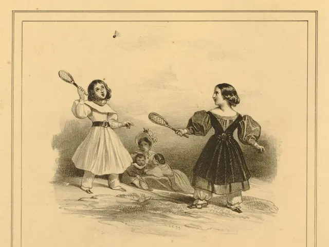 The image shows two young girls playing badminton, each holding a racket in their hands. In the...