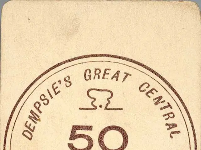 The image shows a card with the words "Dempsie's Great Central 50 Cents" written on it against a...