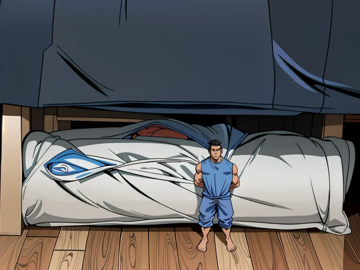 Under-bed storage space showcased in reviewer's bed photo Underbed storage showcased in reviewer's bed photograph