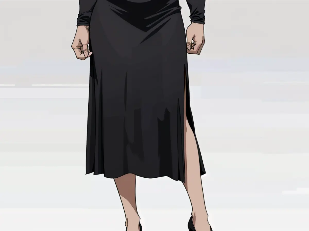 Individual sporting a black midi skirt with a side cut and black sharp-toed pumps. Individual sporting a black midi skirt with a side cut and black stiletto shoes.