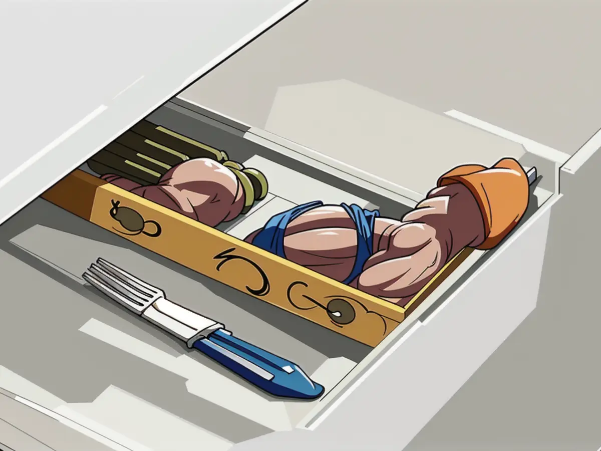 utility storage solution for efficiently arranging and managing silverware Utensil storage system arranged neatly