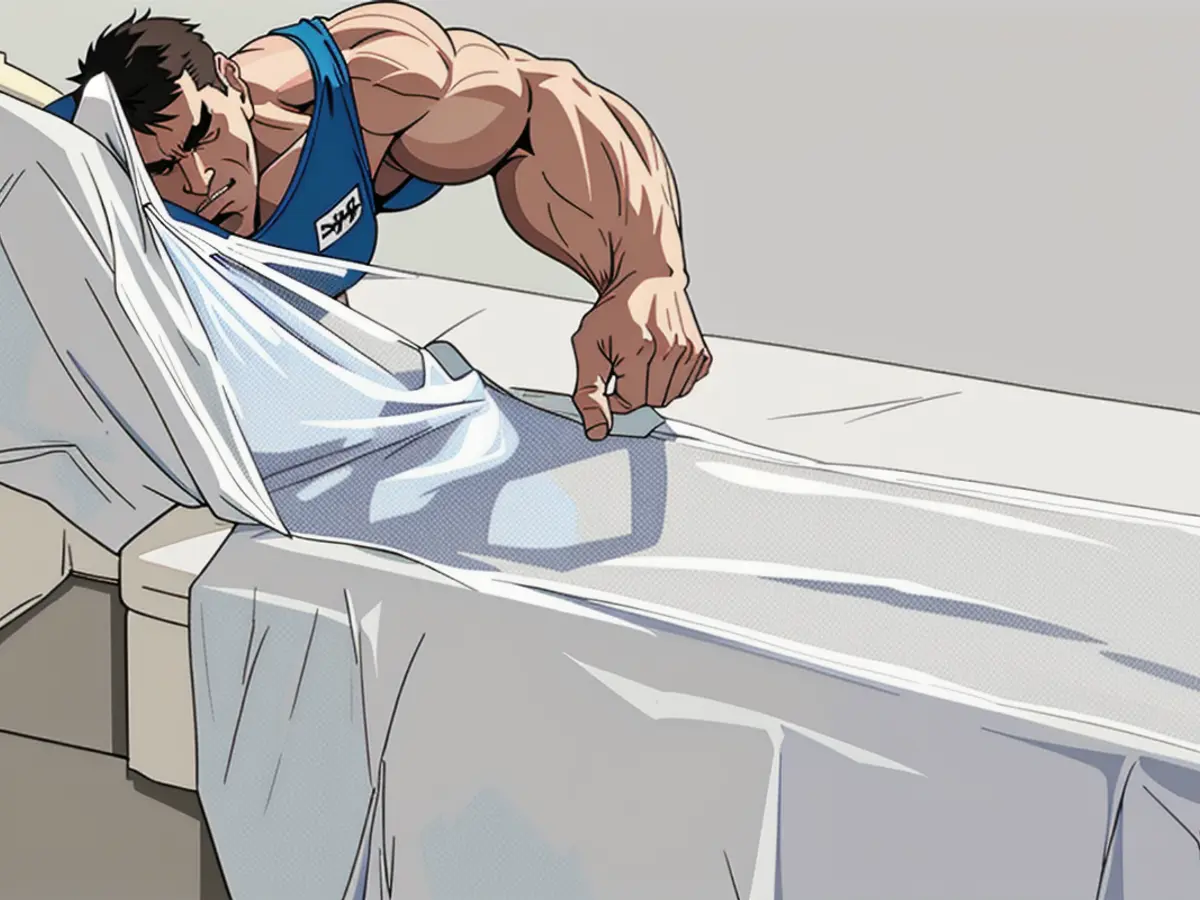 Child peacefully slumbering, protected by a white-mesh safety side rail in the bed. Child napping with a white security bed rail set up on one side.