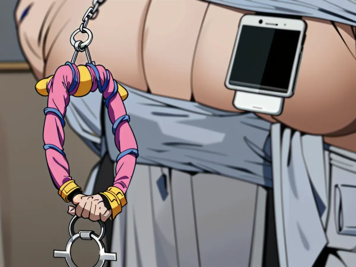Keychain-connected device caught on tape Keychain-attached device connected for unlocking purposes