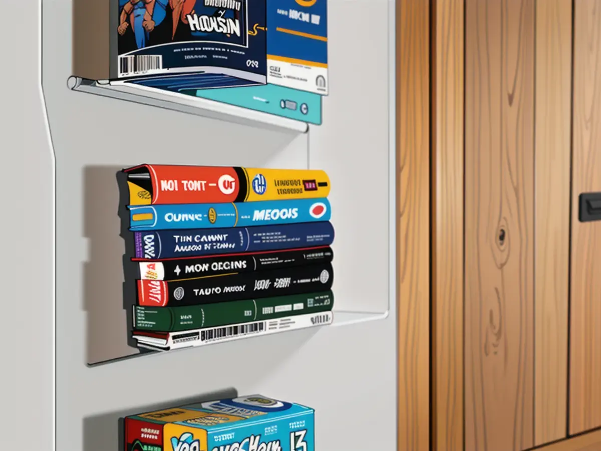 Display of three suspended bookshelves, each filled with books Floating Bookshelves Showcasing Various Books in Three Stacked Arrangement