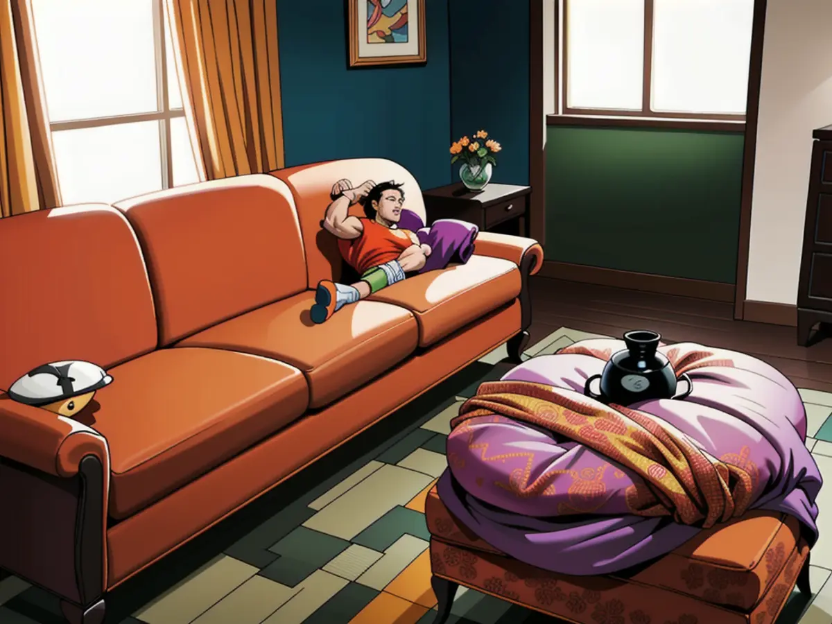 Living room area featuring an orange-hued couch and a patterned footstool standing nearby. Upholstered orange couch in the living room area, positioned near a patterned ottoman.