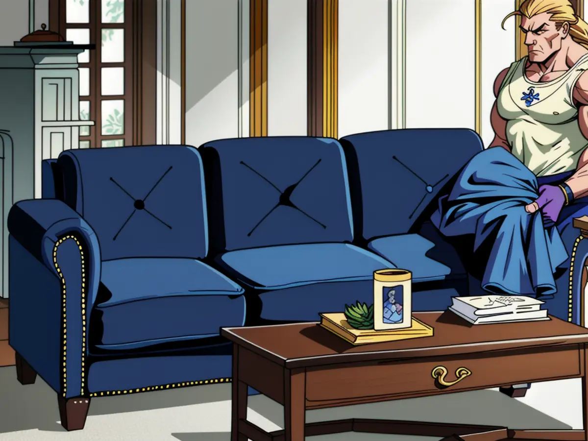 Three-piece couch in royal blue, adorned with nail head detailing Three-seat royal blue sofa adorned with nail head detailing