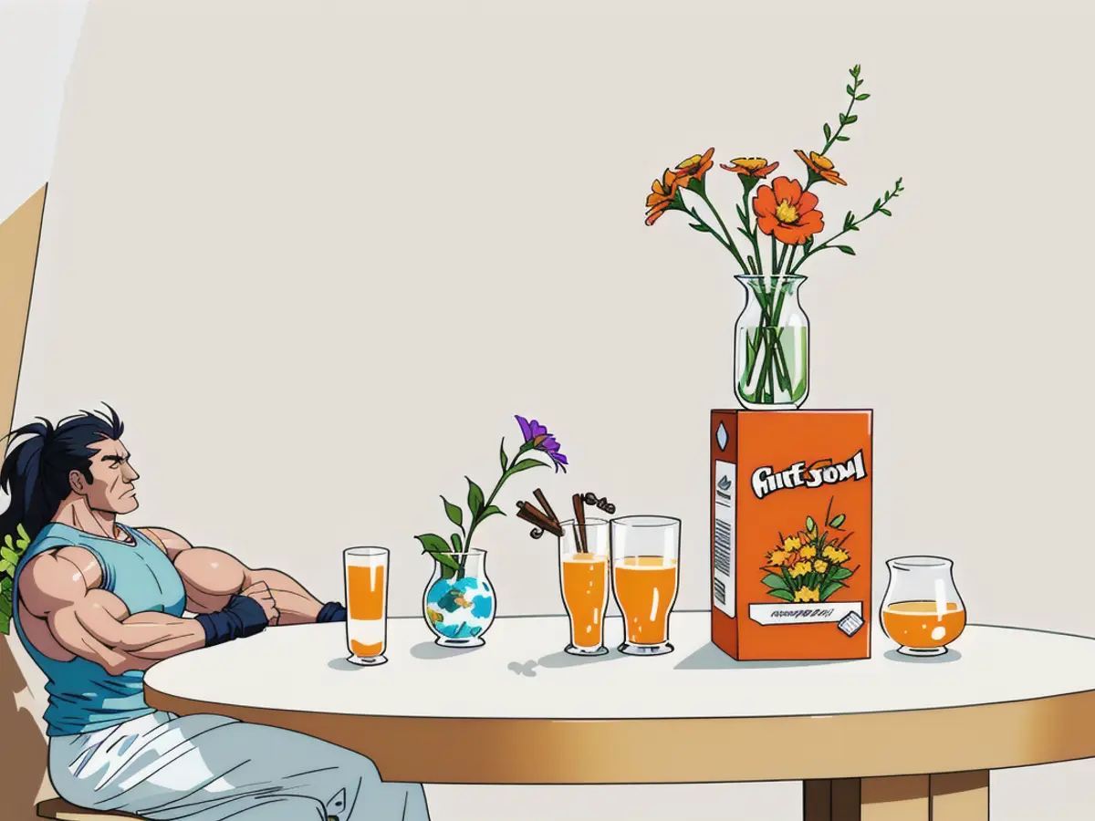 Table adorned with a vase containing a modest arrangement of flowers, the vase originally housing orange juice. Positioned on a nearby table. Table adorned with floral arrangement in a used orange juice container, set on a nearby surface