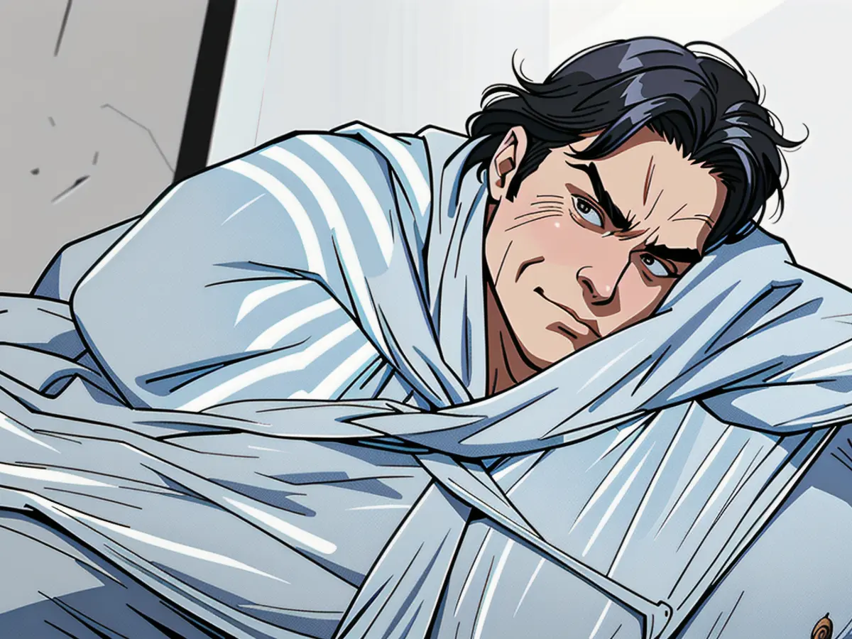 User found comfort beneath a striped, weighted throw.