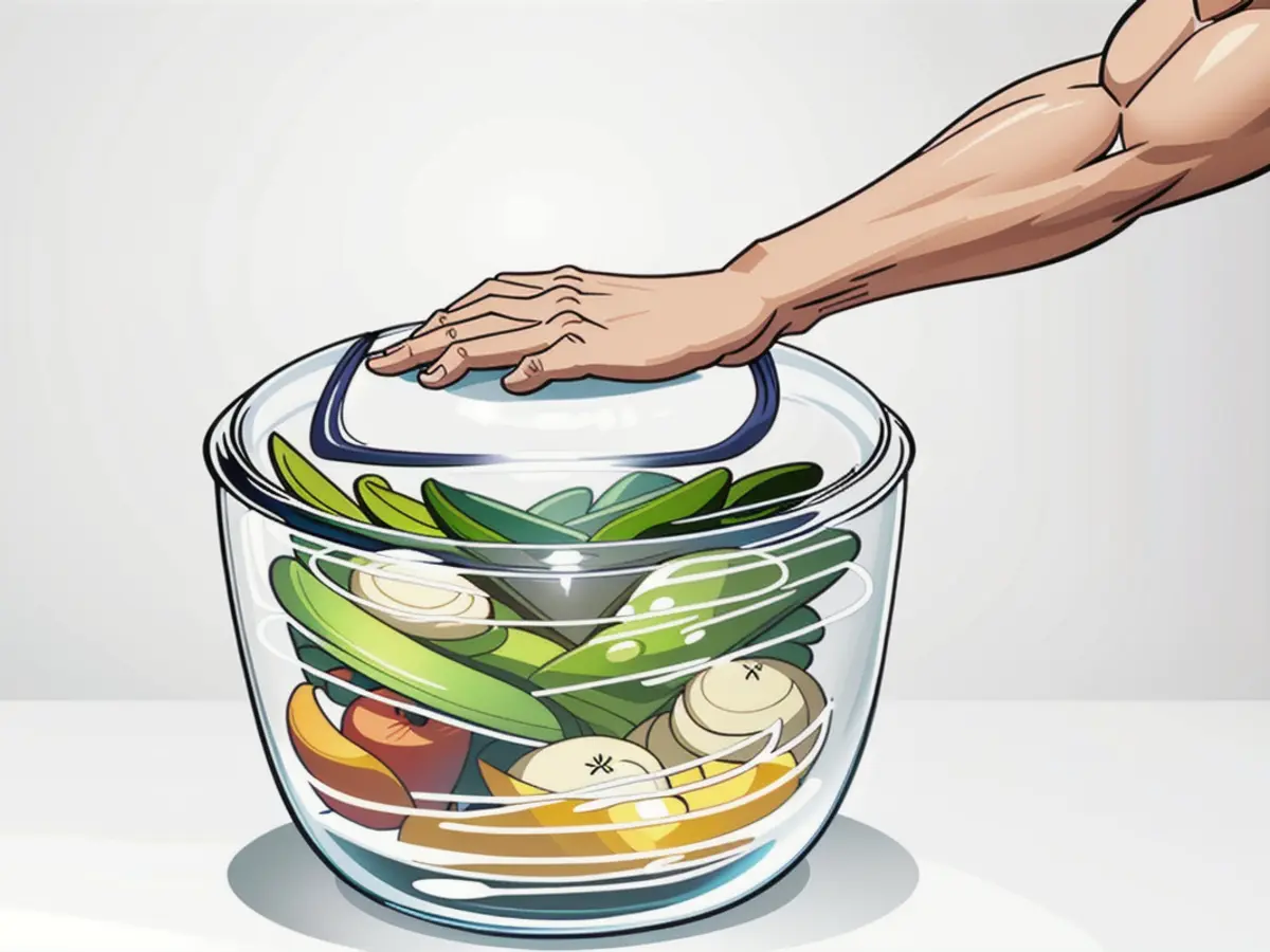 Person Documented Using Spinner for Unconventional Purpose Individual employing salad spinner in photos.