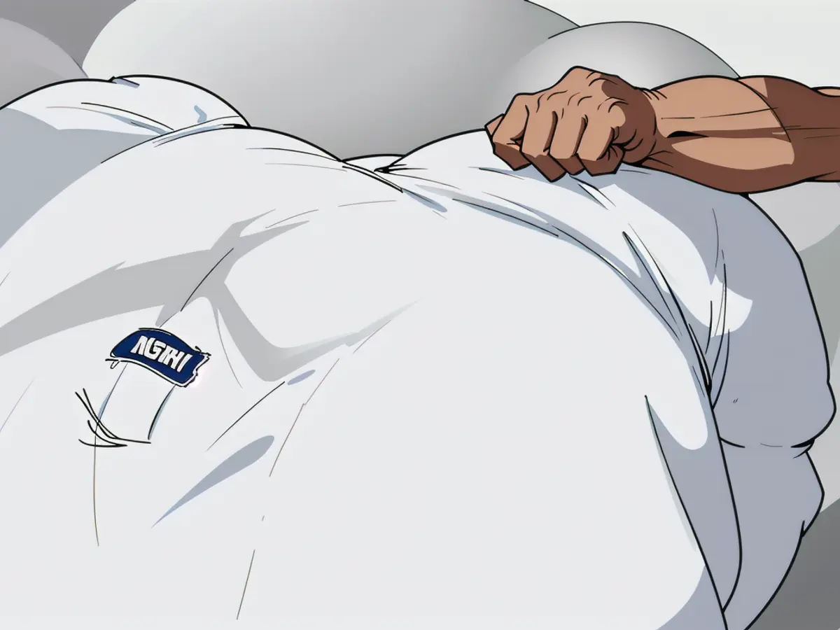 Pillow featuring a hand placement. Pillow featuring a hand placement