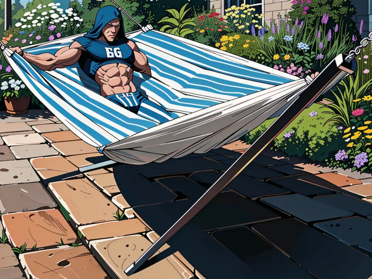 Hammock with blue stripes, supported by a black metal frame, sitting on a brick patio within a garden