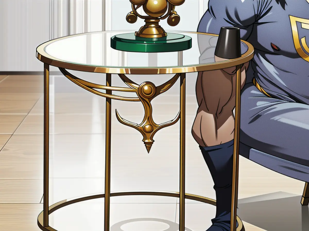 Gold-accented Round Table with Glass Top and Sturdy Legs Gold-accented Circular Table with Glass Top and Legs Made of Metal
