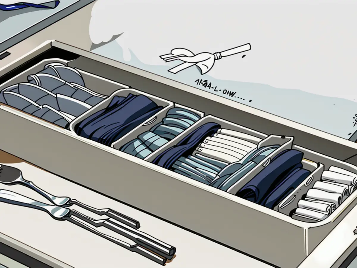 Silverware Storage Solution: Neatly Arranged Cutlery Drawer Organizer Silverware Storage Solution: Streamlined Cutlery Drawer Organizer