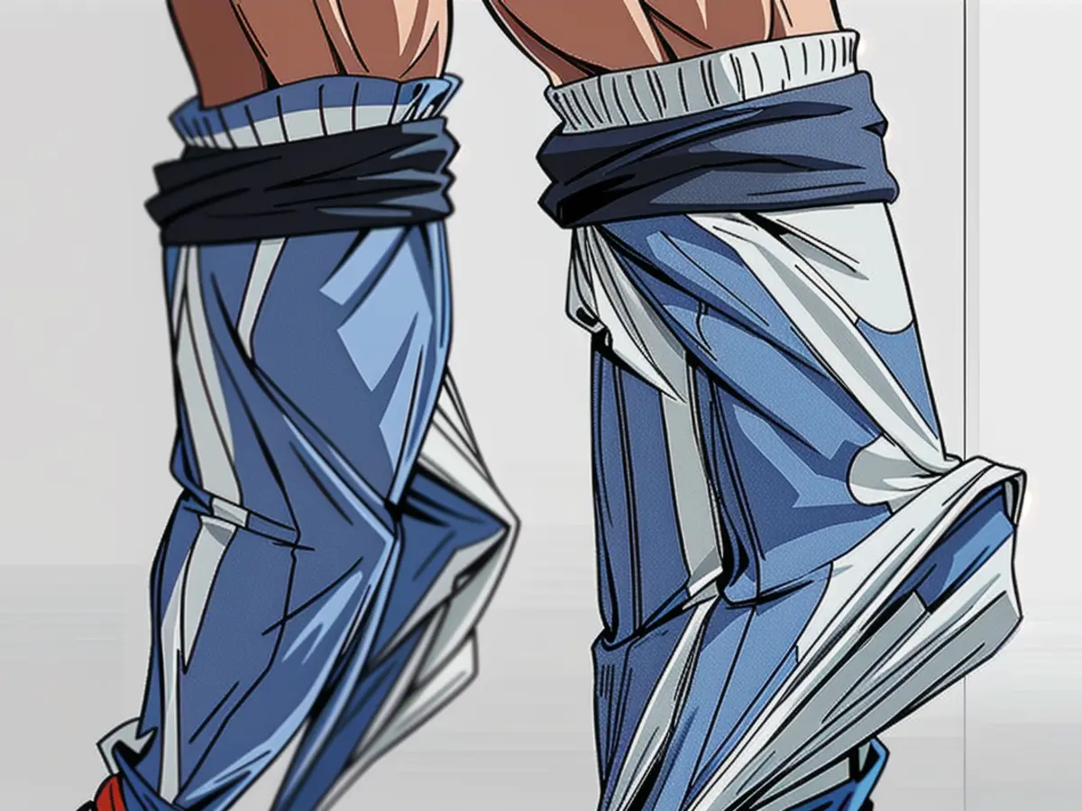 Individual precariously balanced on tiptoes, donning blue colorblock crew socks.