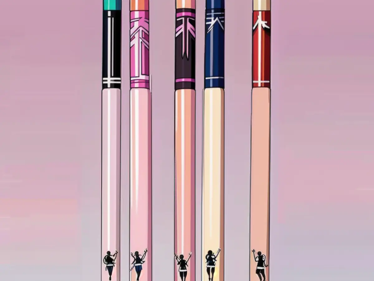 Five vibrant eyeliners, elegantly displayed against a gradient pink backdrop. Five eyeliners, highlighted, presented against a gradient backdrop of pink hues.