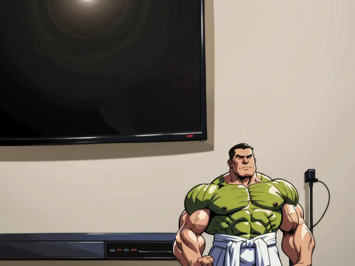 Close-up image of a BuzzFeed employee's TV, displaying a beige cable concealer.