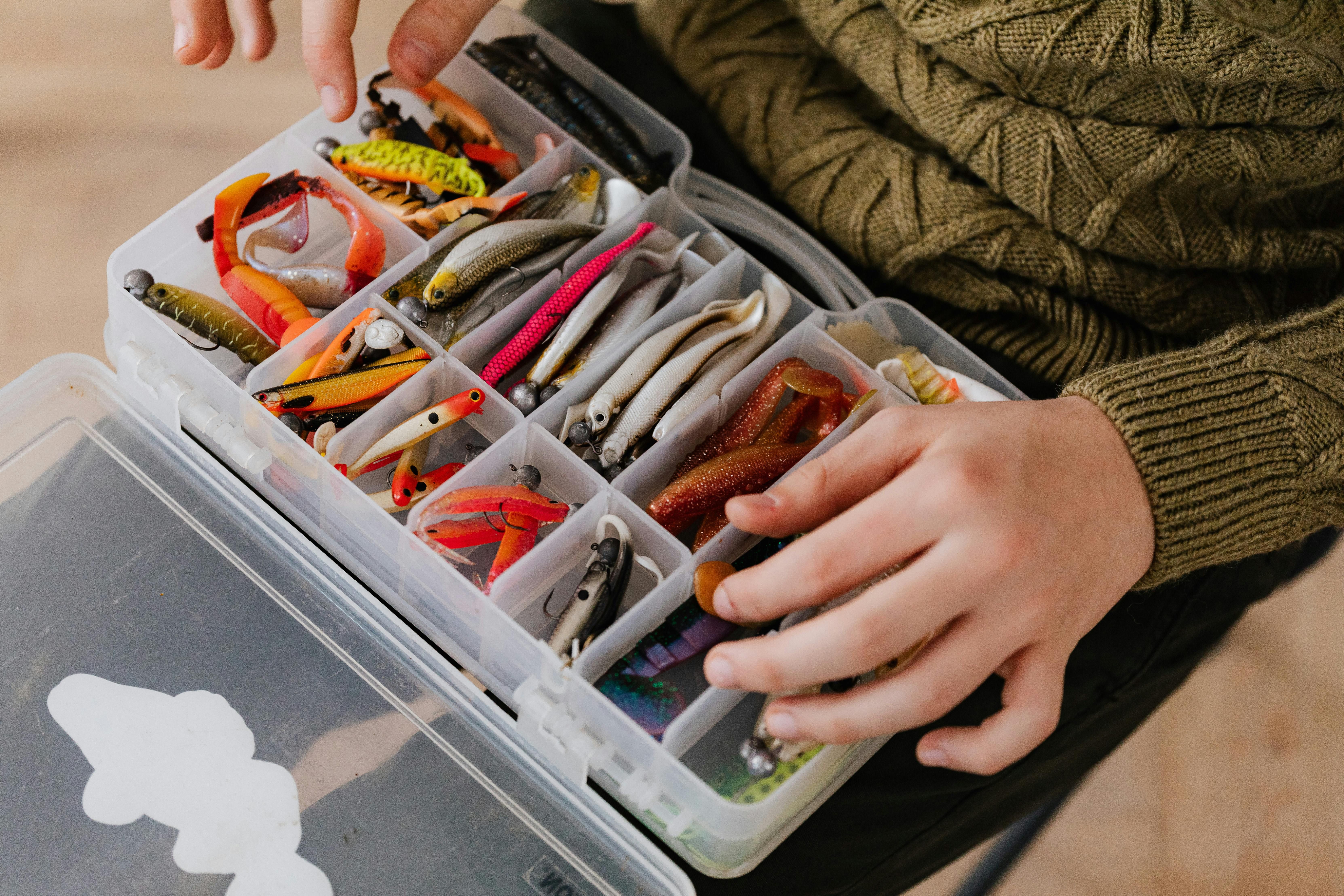 Container holding miscellaneous objects within. Container holding a variety of objects inside