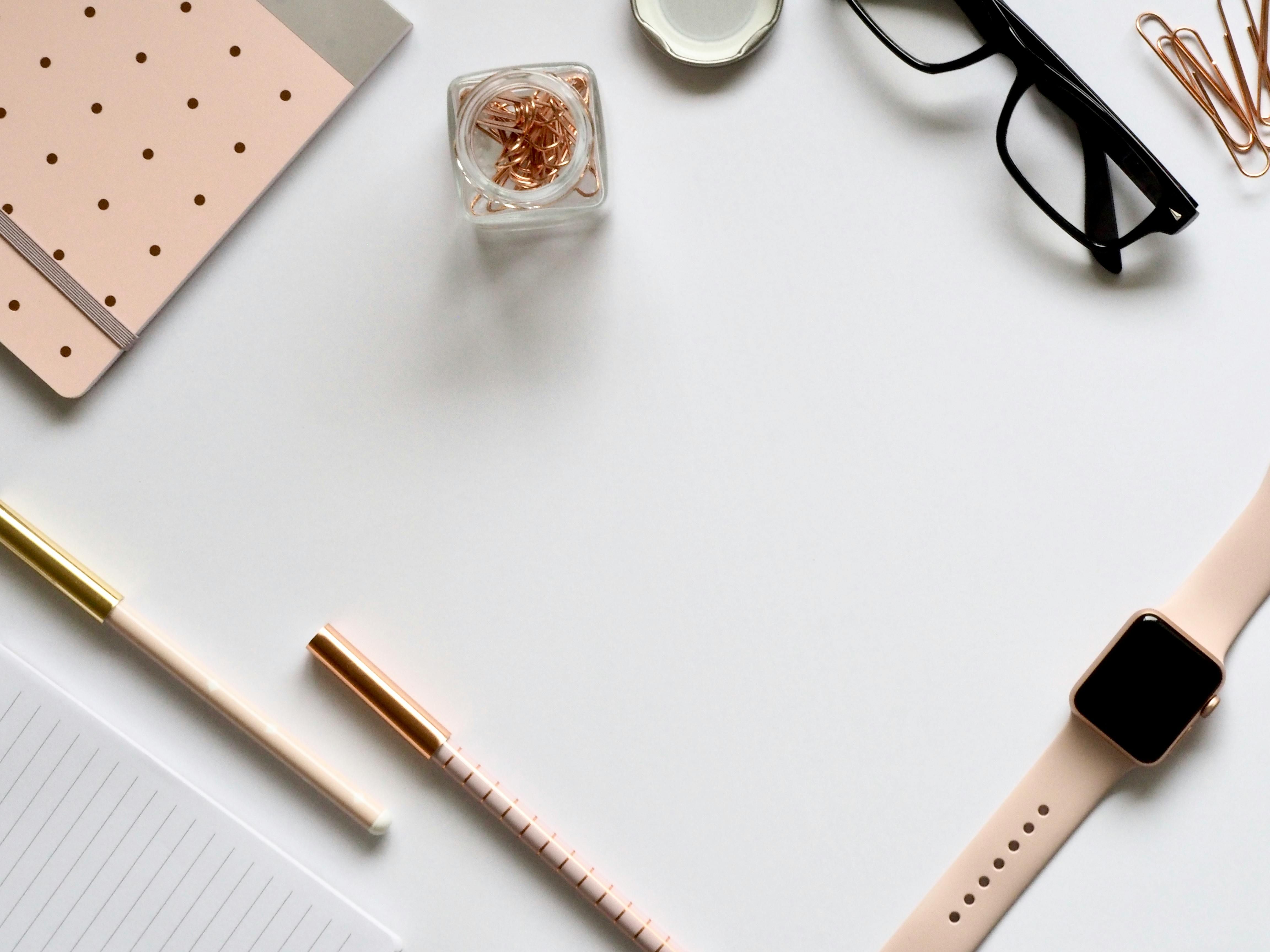 Office supplies arranged neatly atop a desk organizer