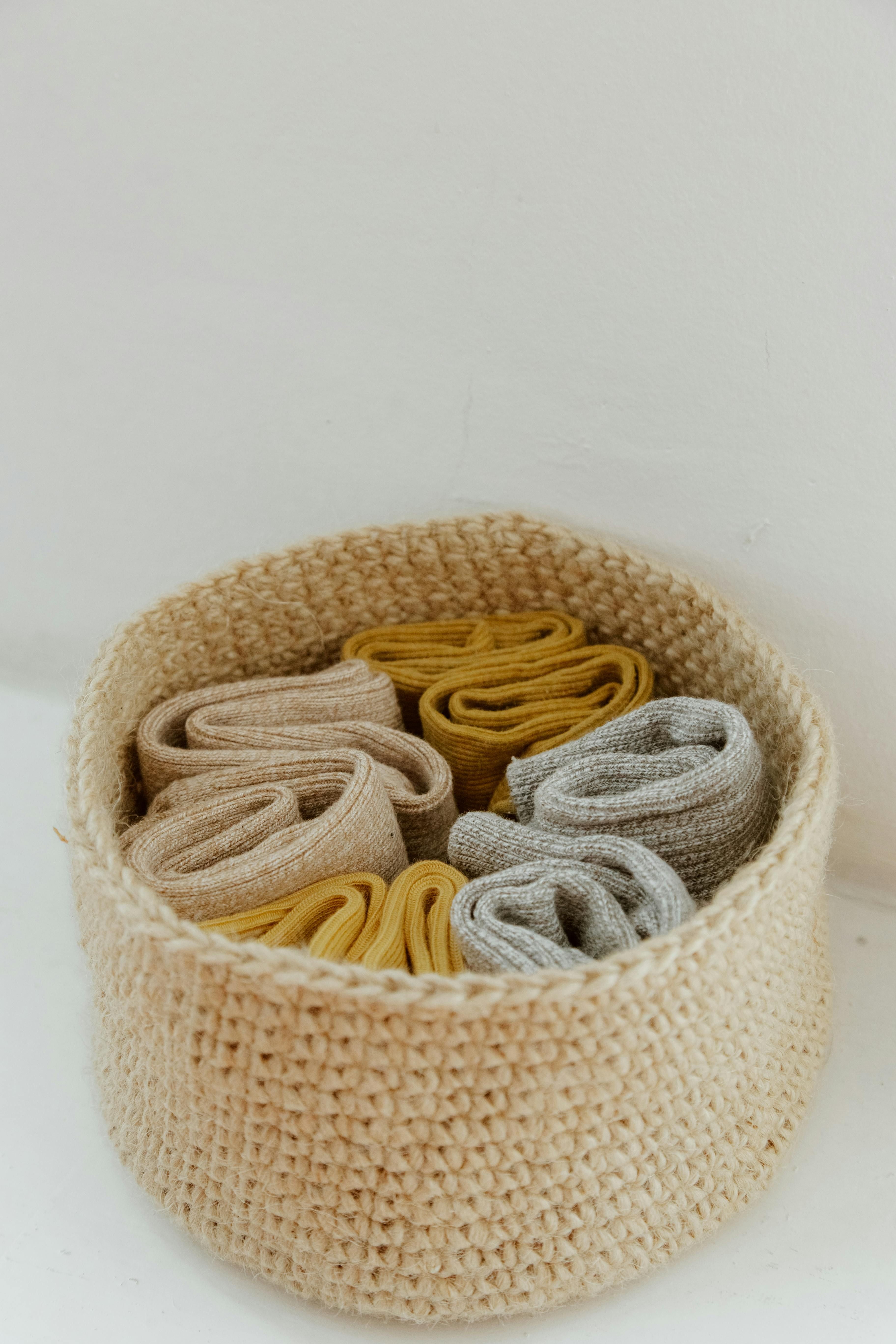 Four grey fabric storage boxes