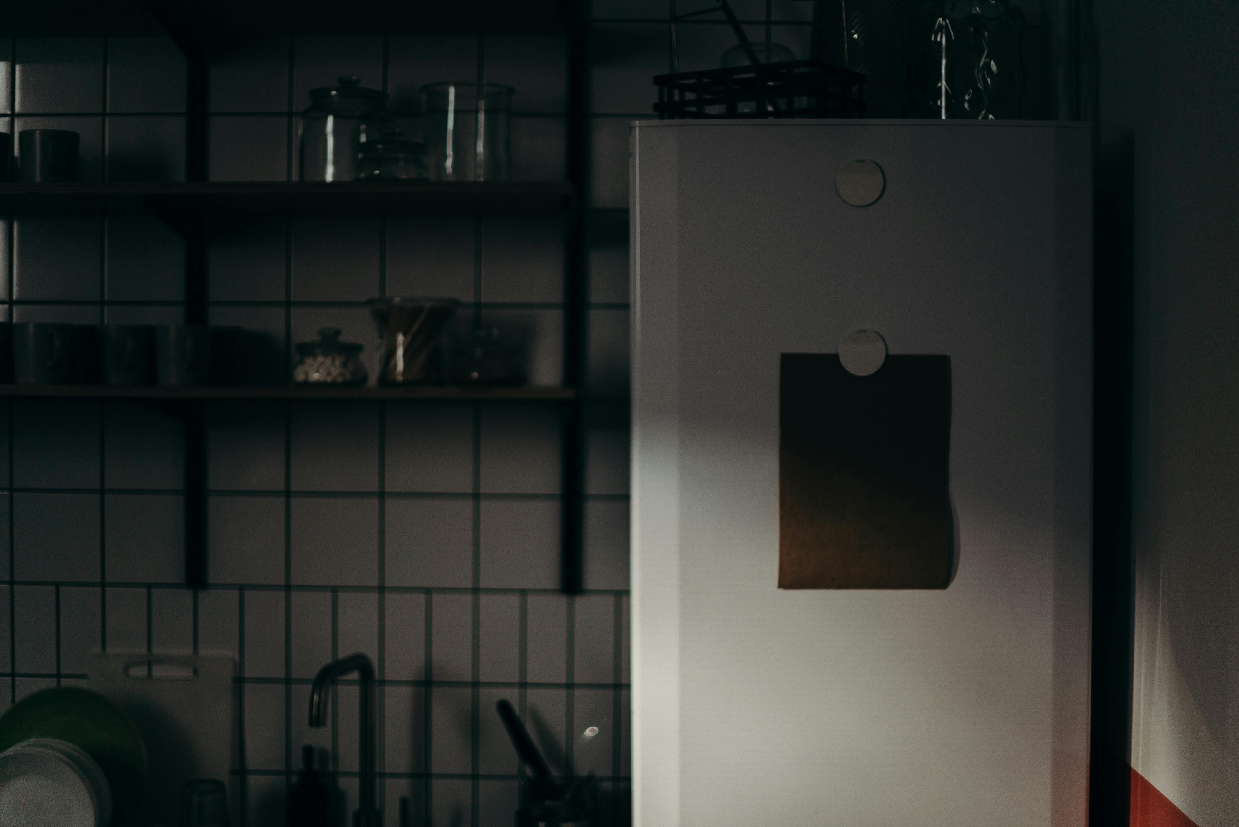Pictured: Rear view of an organized refrigerator, labeled compartments visible. Inside view of a refrigerator showcasing organized storage compartments labeled.