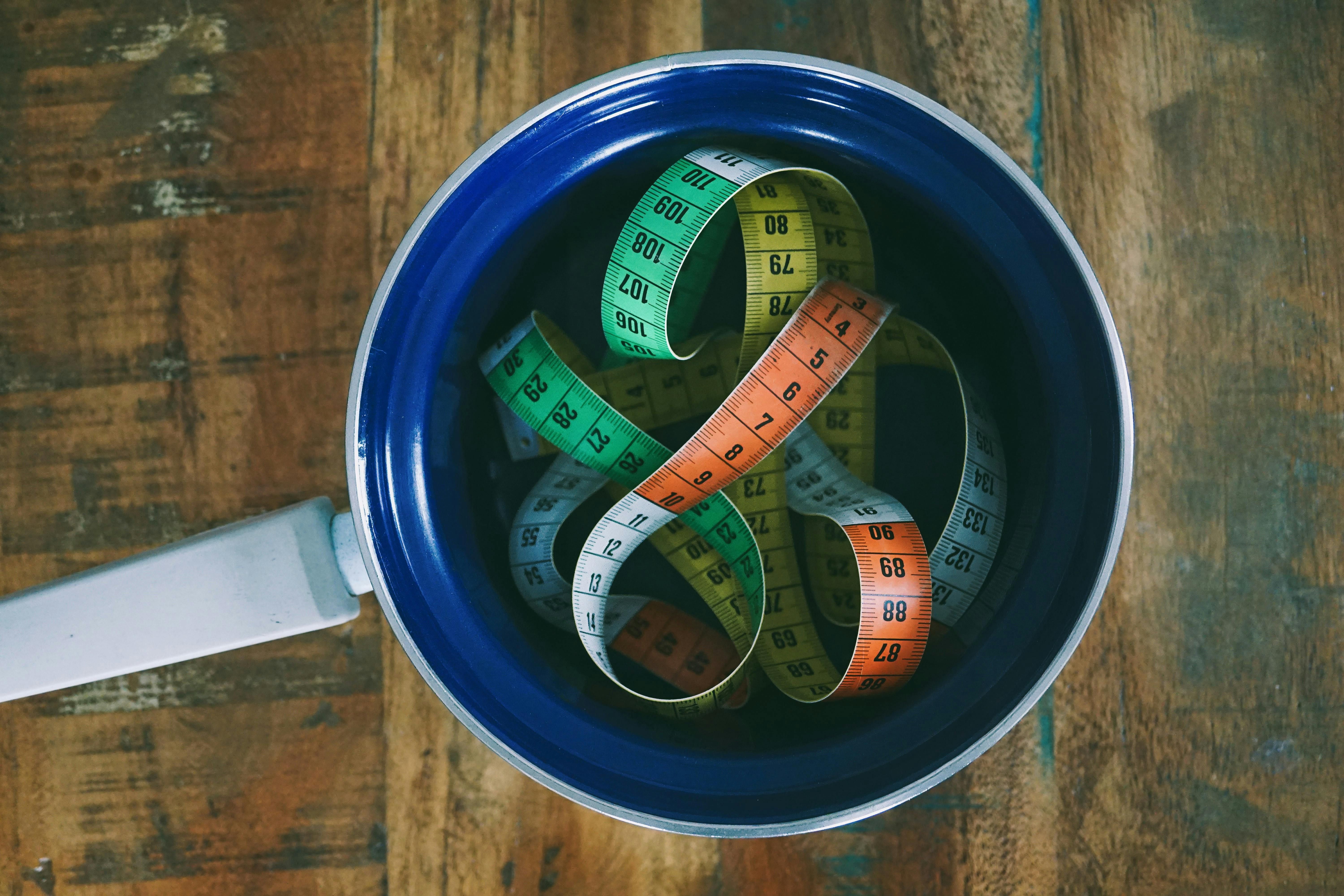 Color-coded mounting options for measuring tapes are displayed Color-variated mounting solutions for measuring tapes displayed