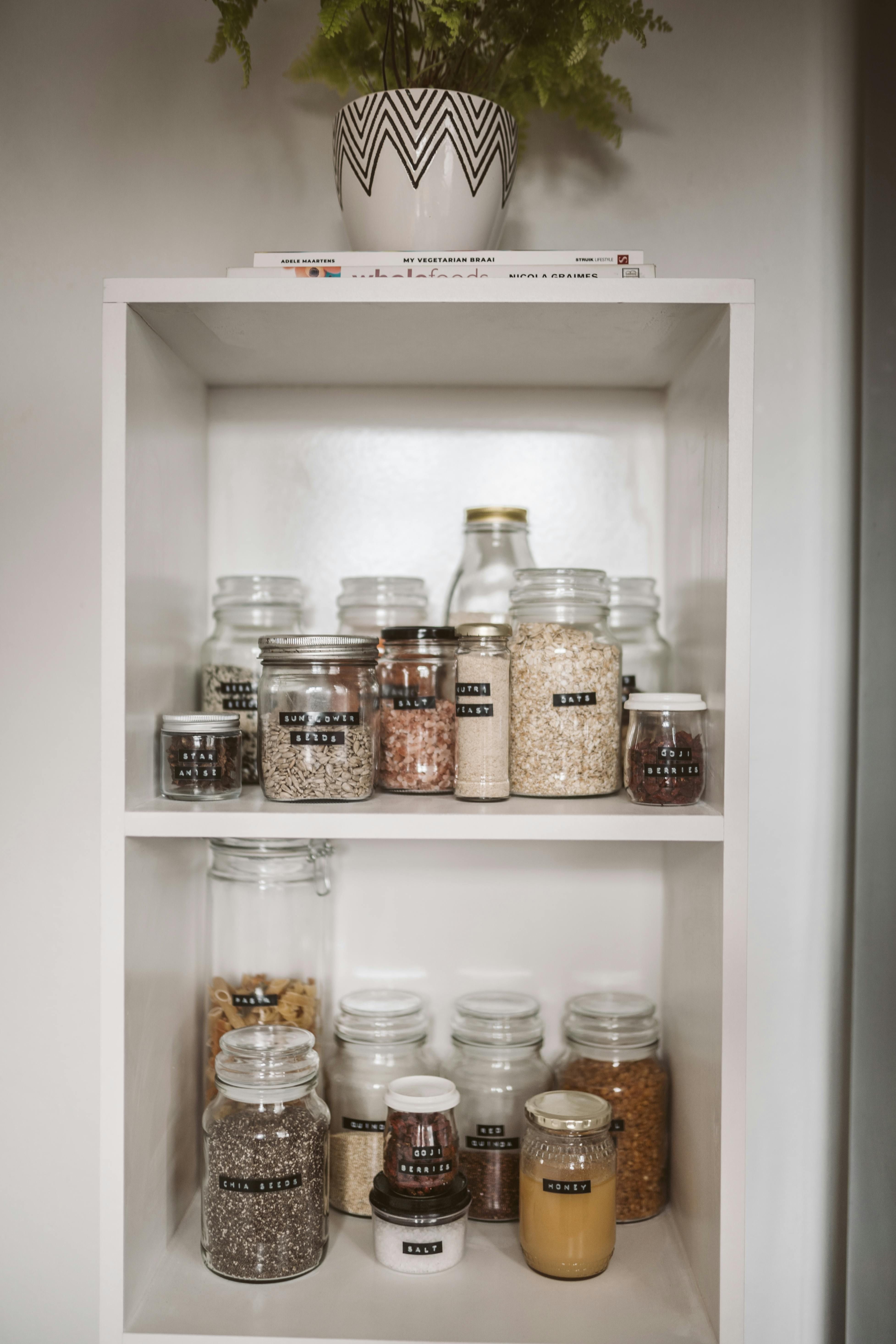 Neatly labeled and organized food containers visible in the pantry pictured in the review Photos reveal food storage containers neatly labeled and organized in the reviewer's pantry.