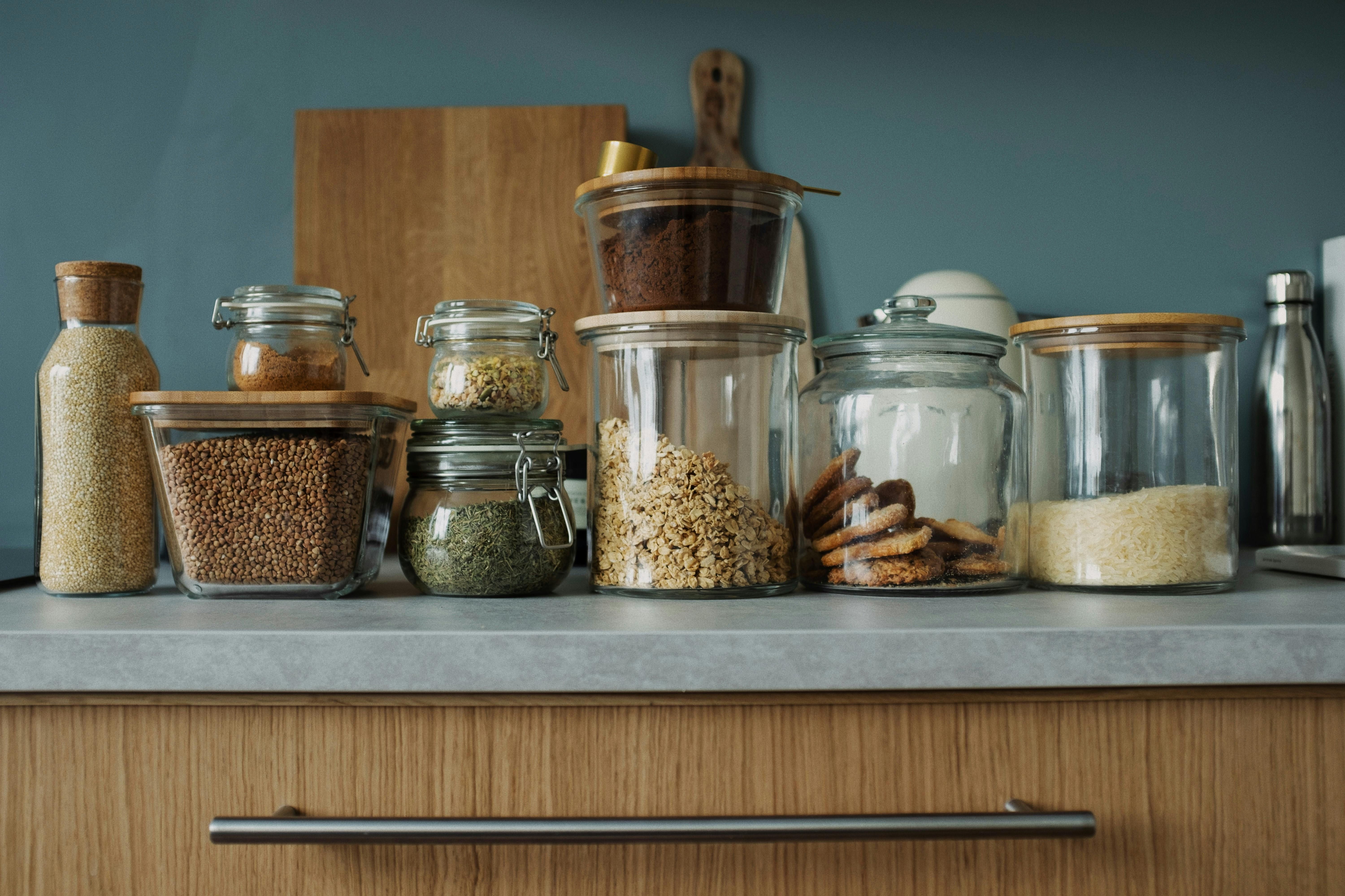 Unkempt and Cluttered Drawer: Initial Image Reveals a Jumble of Spice Containers Disarrayed Drawer Revealed in Reviewer's Pre-Photo, Filled with a Multitude of Spice Containers