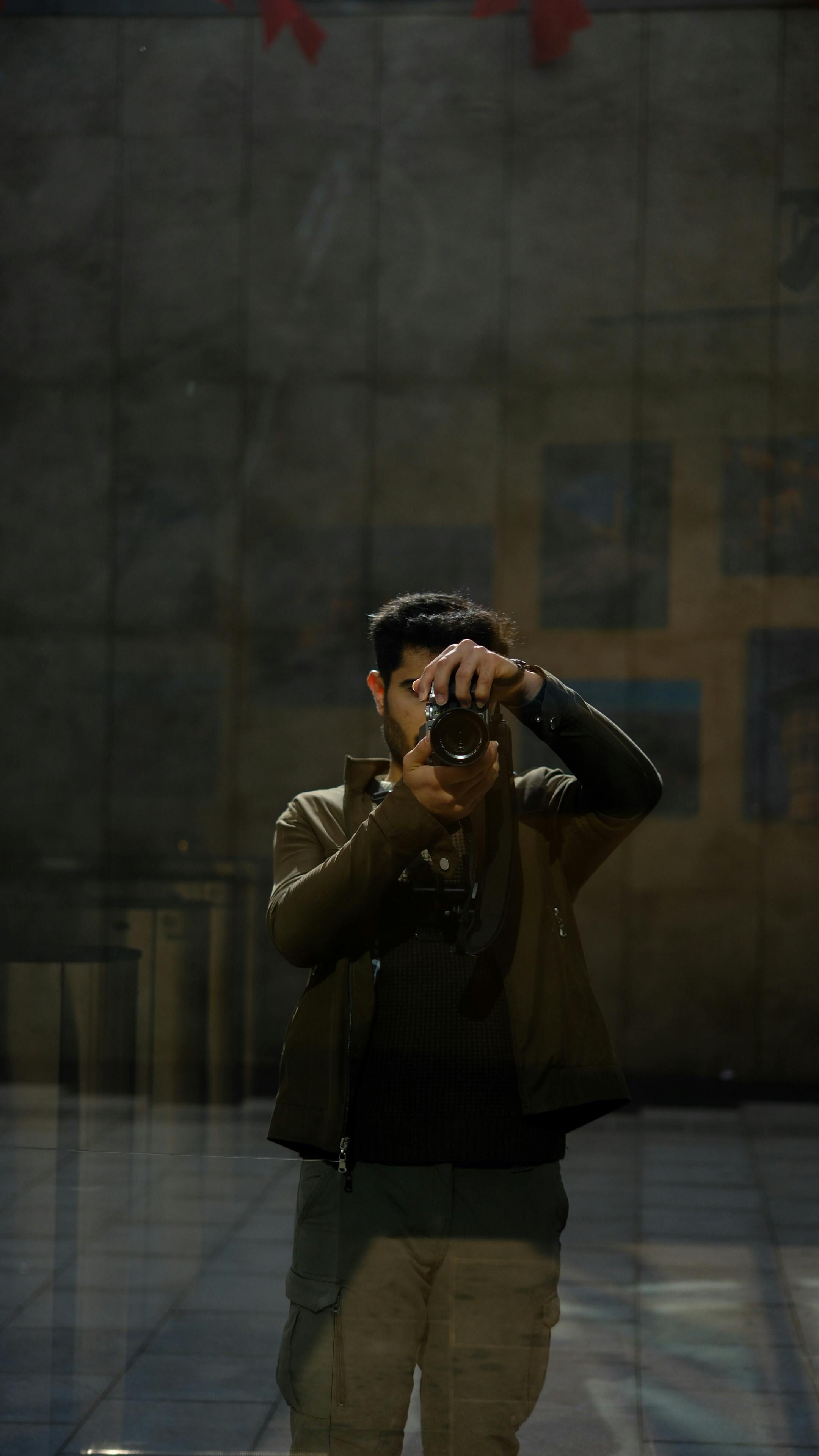 Image depiction of a spotlit mirror against a wall critique reflection captured of illuminated mirror featured on a wall