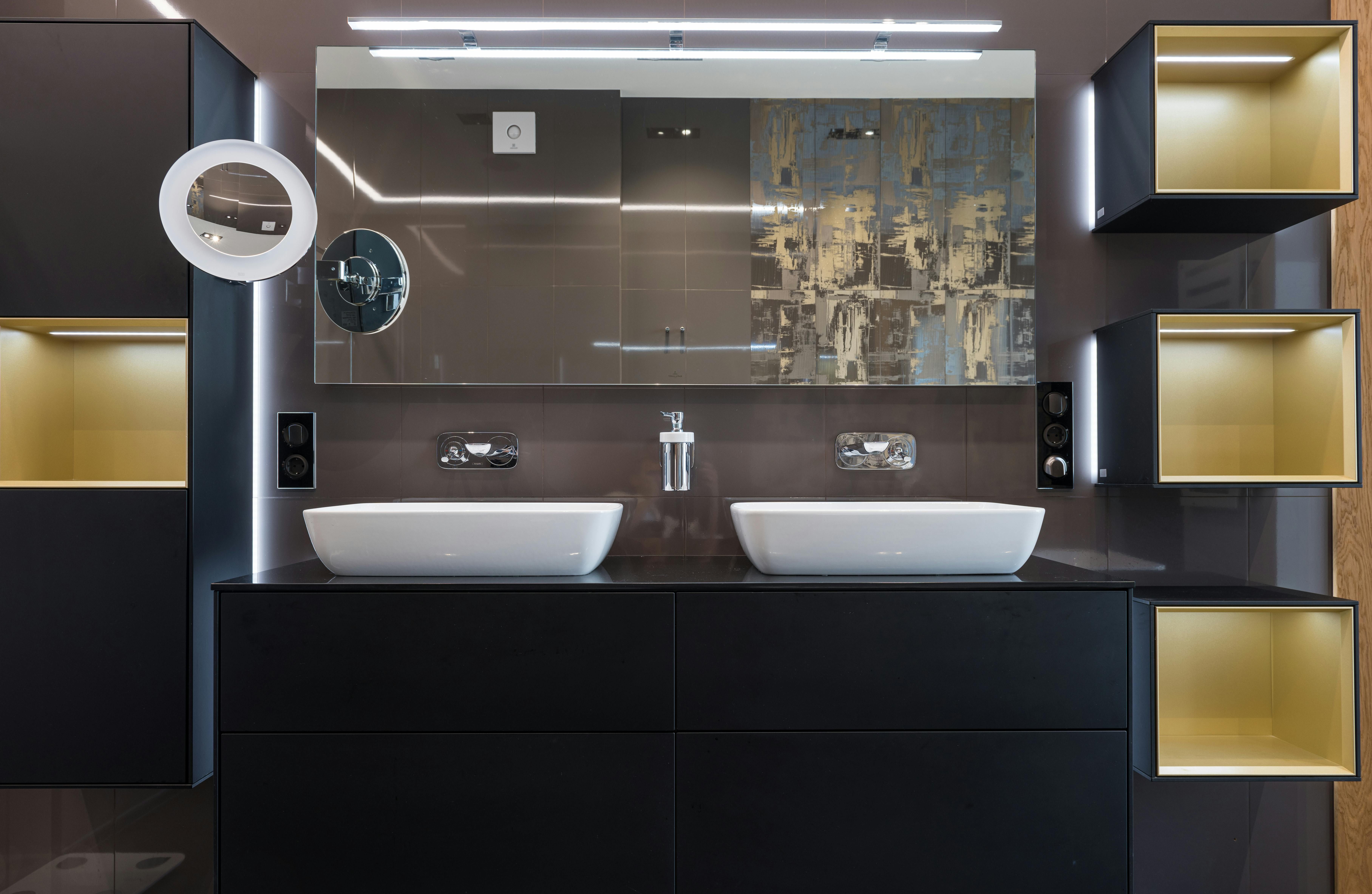Image of a reviewer's black vanity light fixture installation Image of a reviewer's snapshot featuring a black vanity light fixture