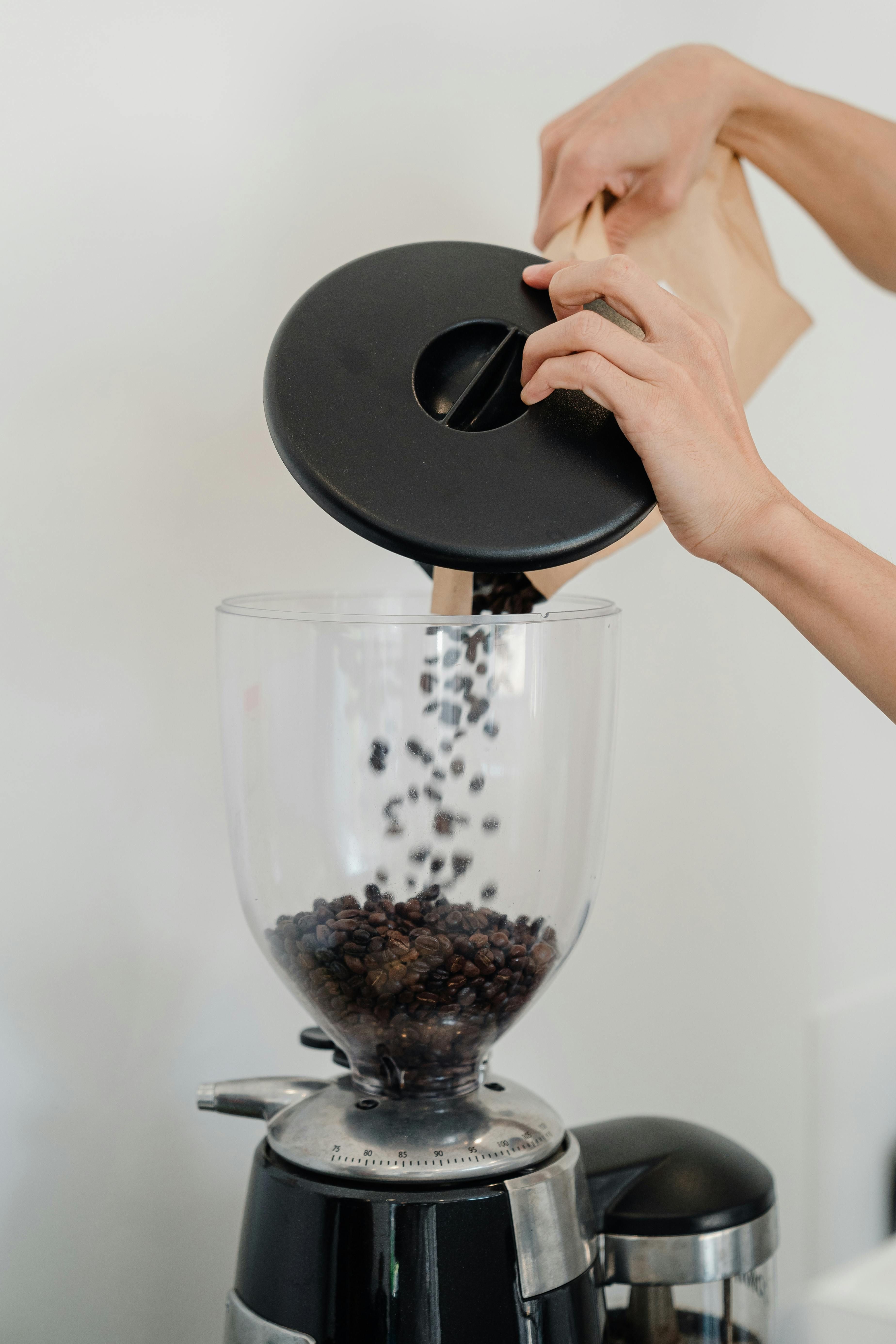 Espresso being transferred into the accompanying lid of a Nanospresso brewing device
