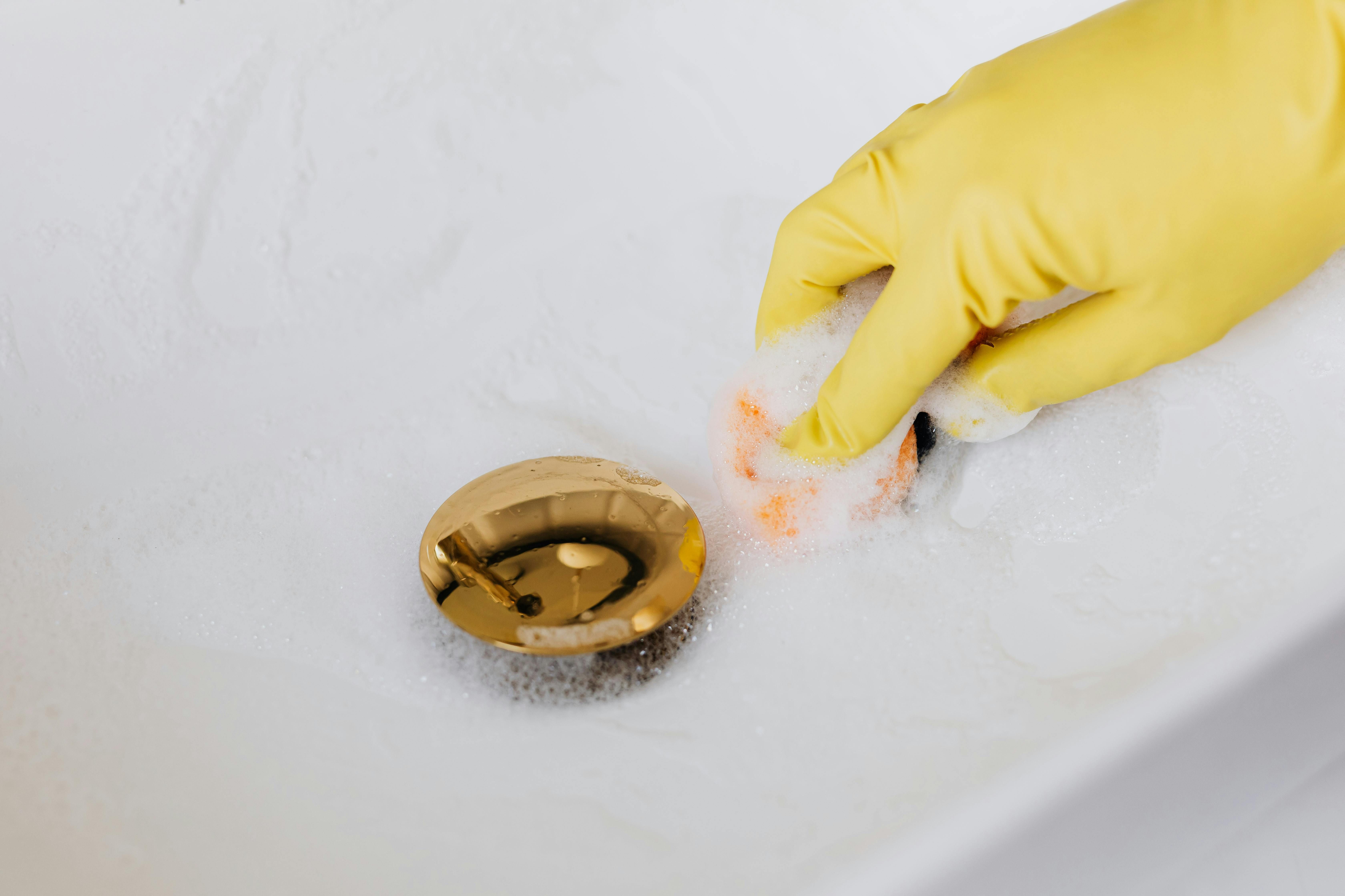 Gold disappearing down the kitchen sink drain Gold draining from the sink