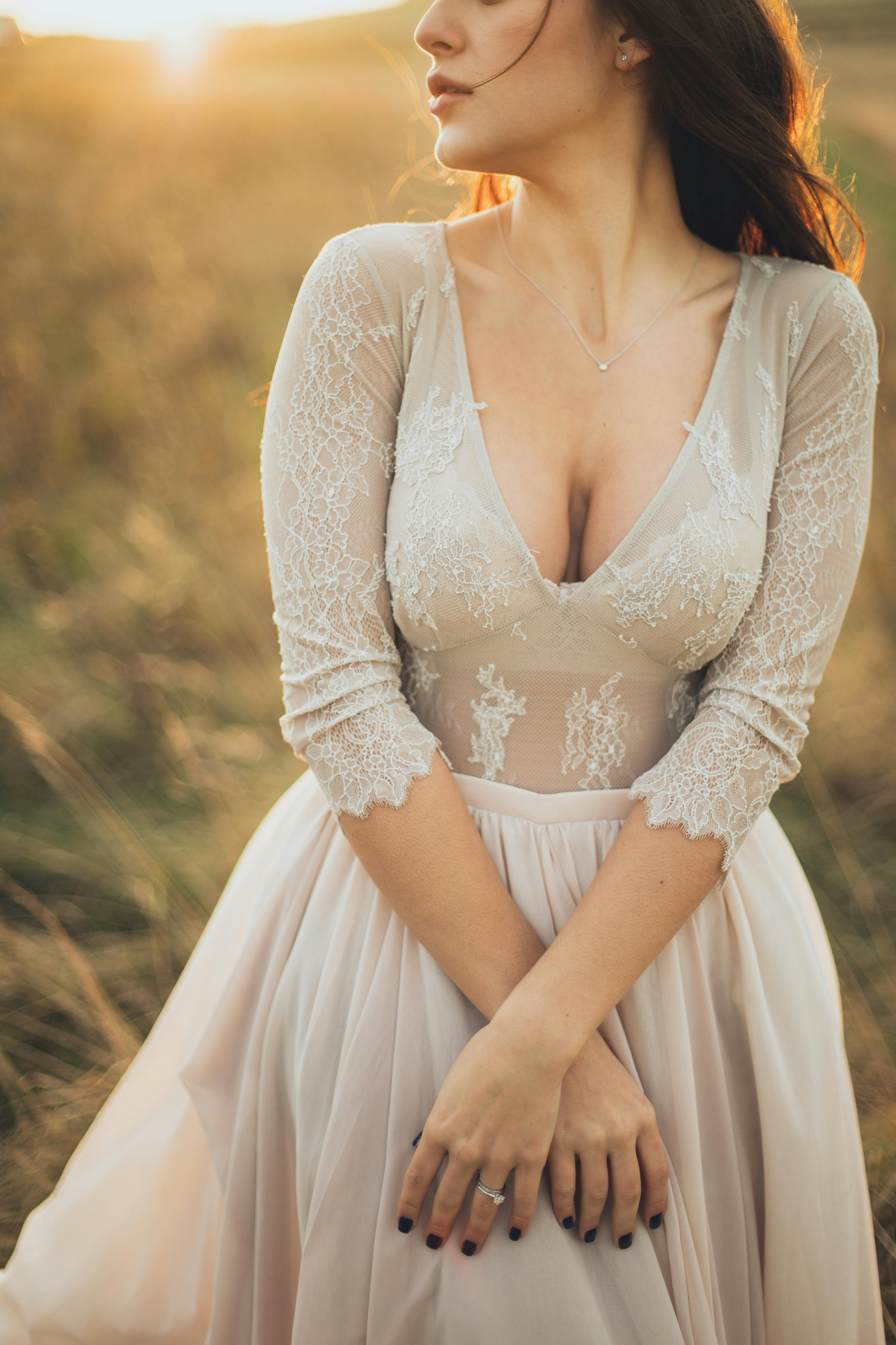 Detailed view of model's dress sleeved garment. Detailed shot of the arm portion of the dress worn by the fashion model