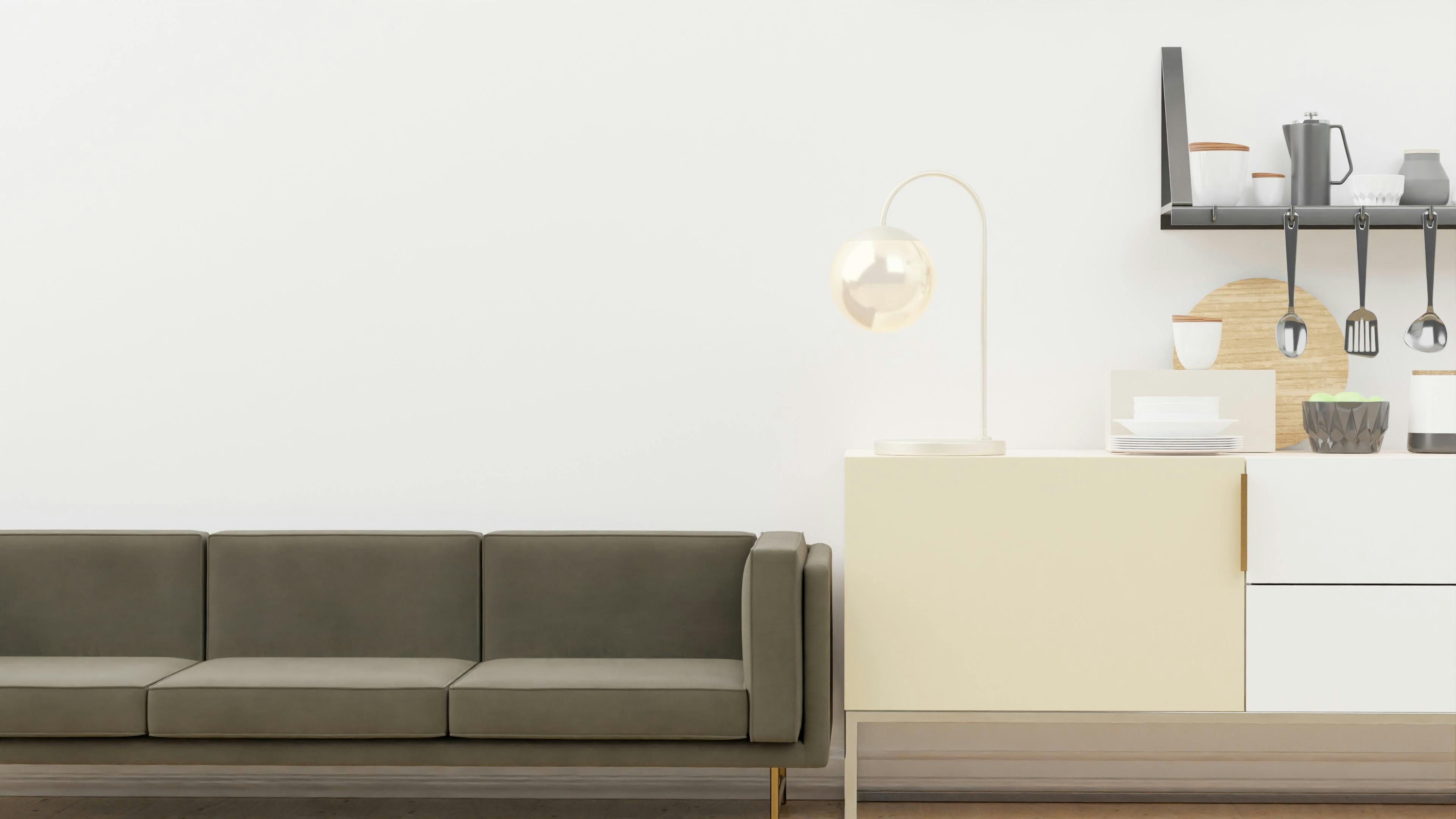 Minimalist living room adorned with a contemporary mustard couch, shelving units, and a hanging light fixture, showcasing various decorative items. Minimalist living room adorned with a modern mustard-colored sofa, showcasing background shelves displaying assorted decorative items and a suspended lamp overhead.